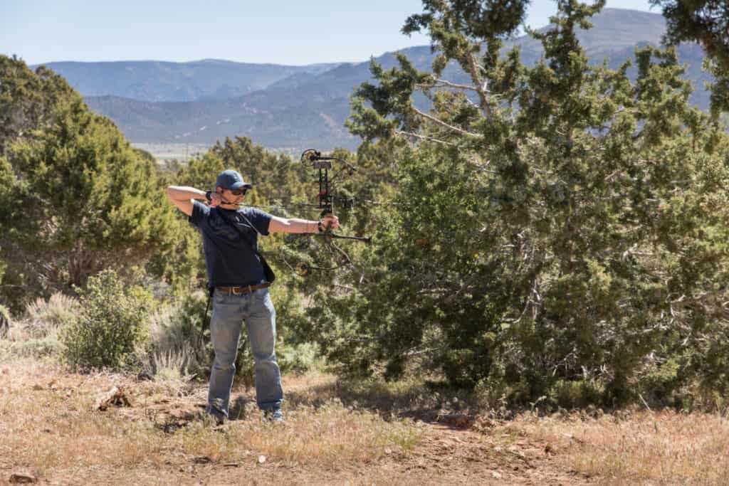 Archer shooting compound bow